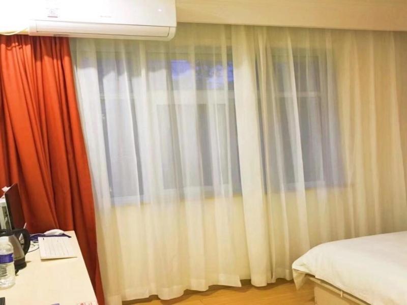Shells Hanzhong City High Railway Station Renmin Road Hotel Bagian luar foto