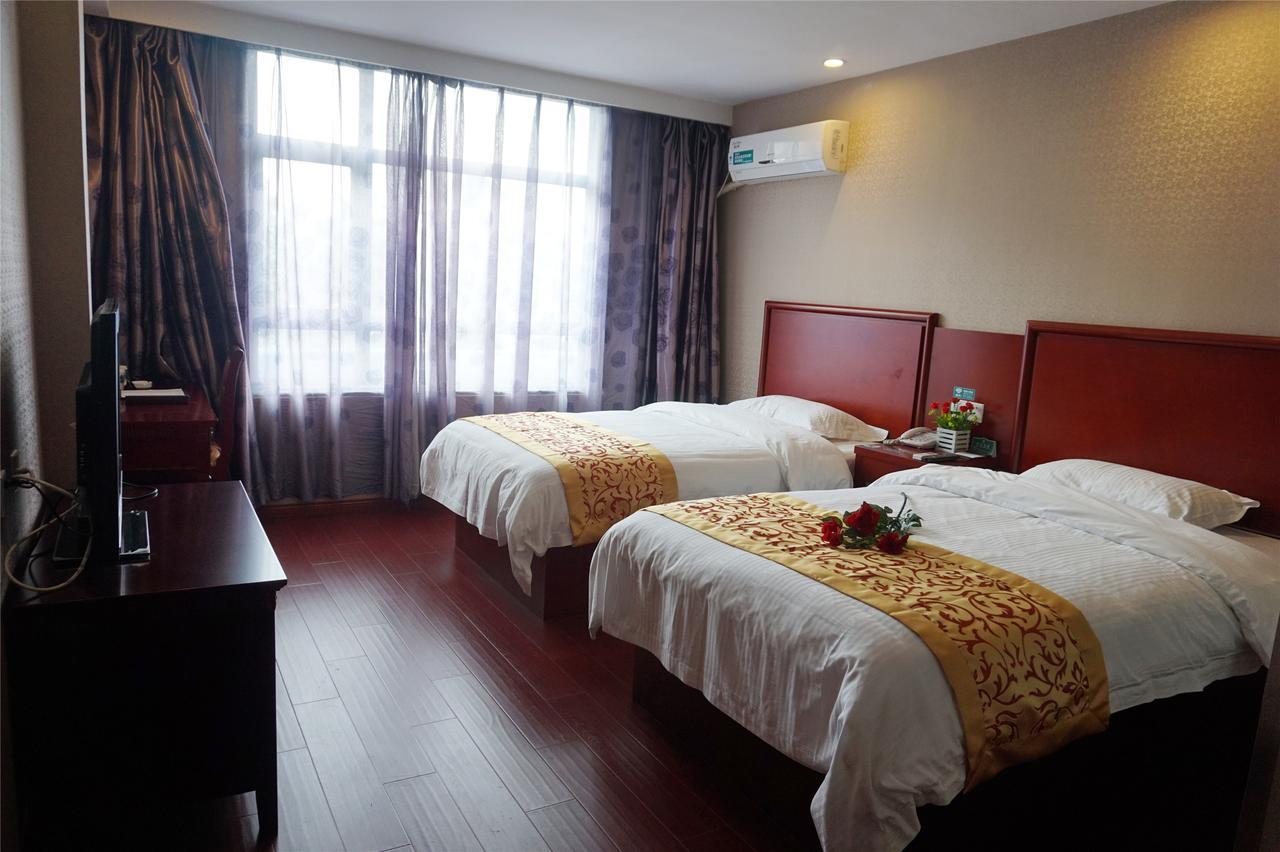 Shells Hanzhong City High Railway Station Renmin Road Hotel Bagian luar foto